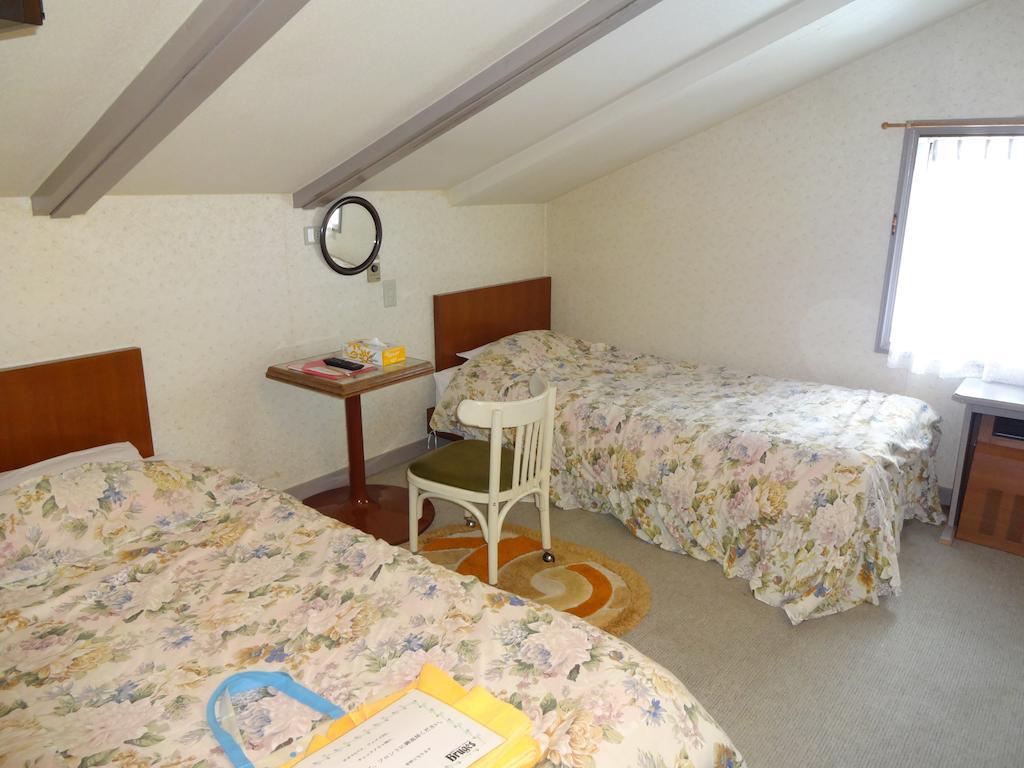 Ishiuchi Pension Bruges Minamiuonuma Rom bilde