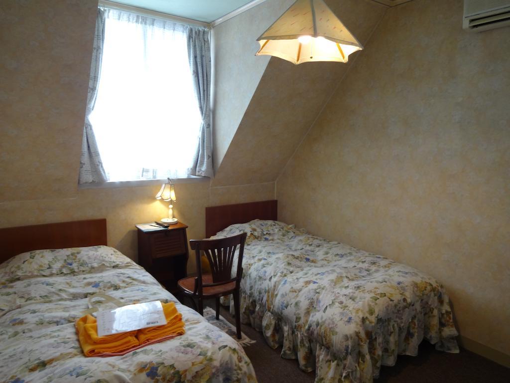 Ishiuchi Pension Bruges Minamiuonuma Rom bilde