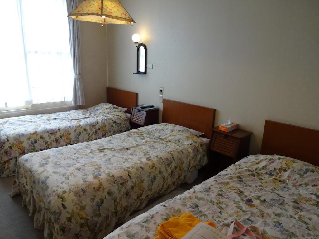 Ishiuchi Pension Bruges Minamiuonuma Rom bilde